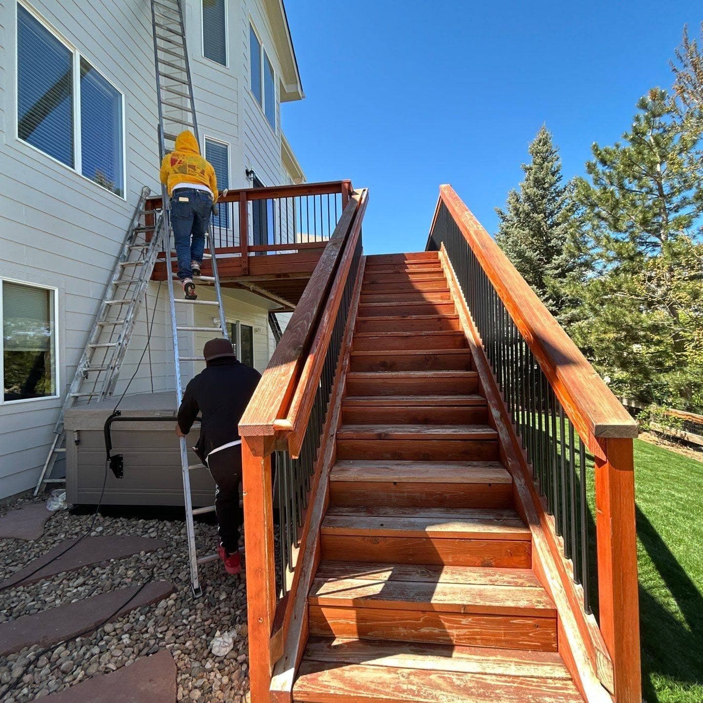 Weathered wood deck staircase before refinishing