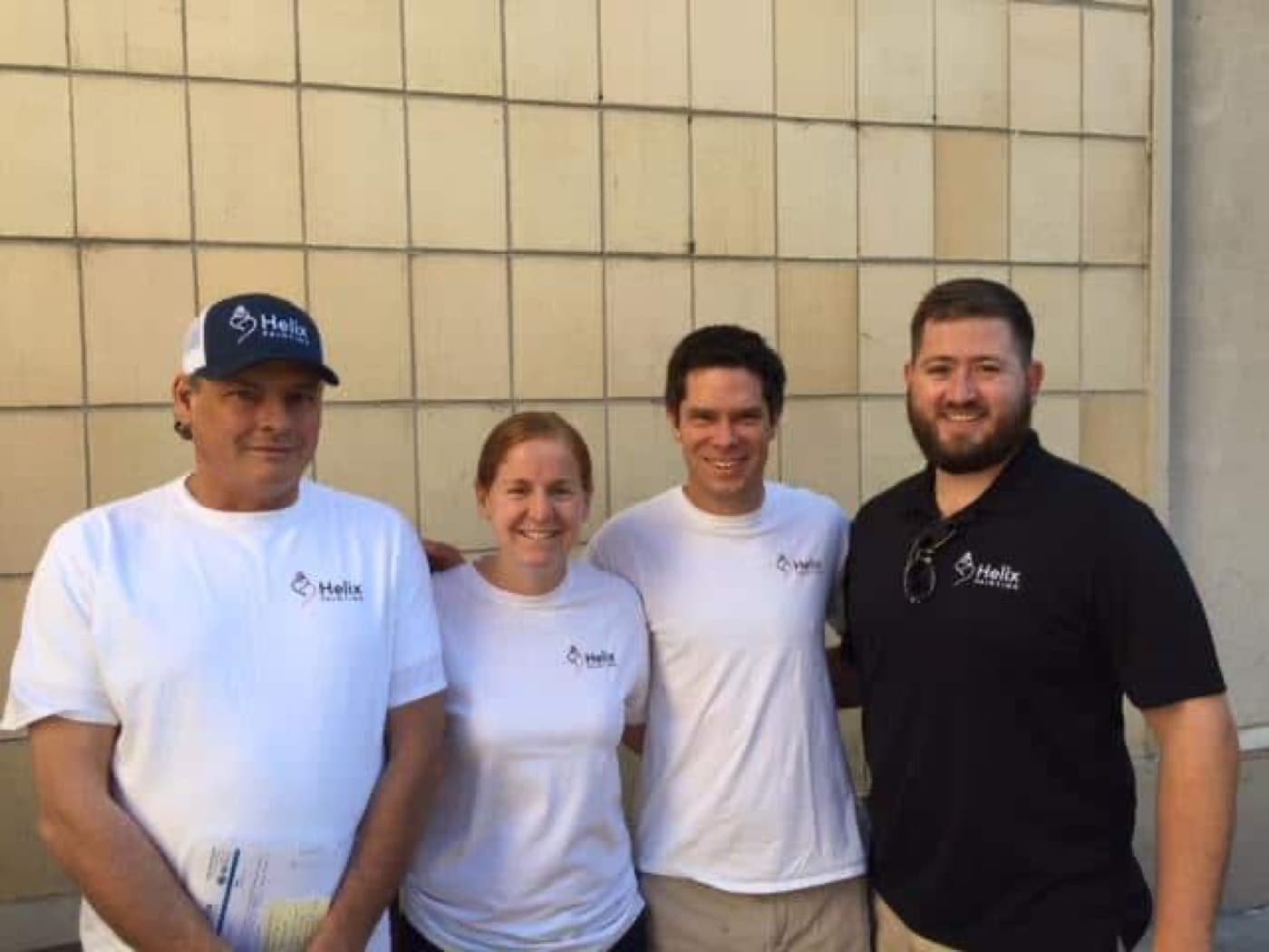 Members of the Helix Painting crew on the day of a donated project