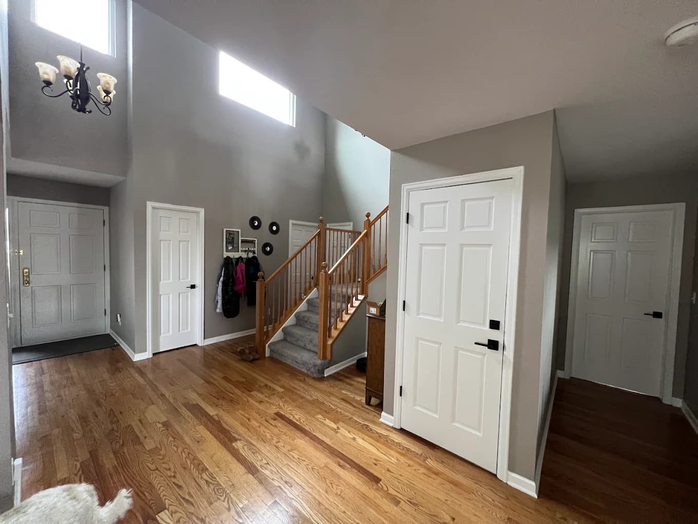Entry hall and staircase with freshly painted walls