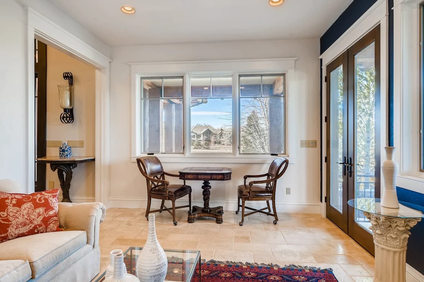 Dining area with a bay window and repainted trim