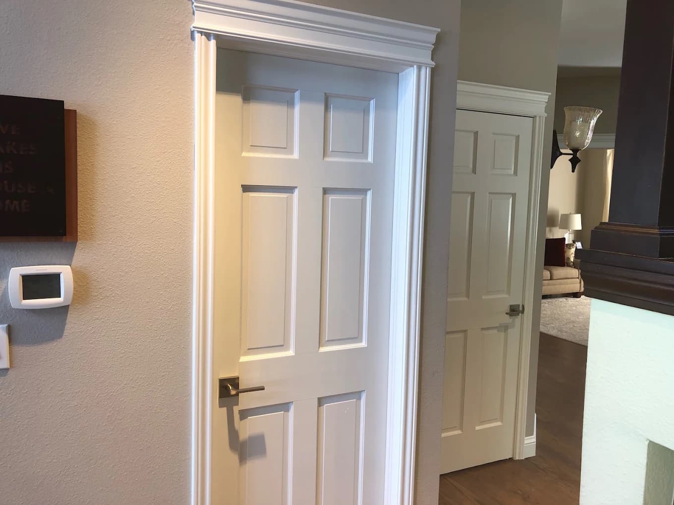 Hallway with repainted doors, frames and trim