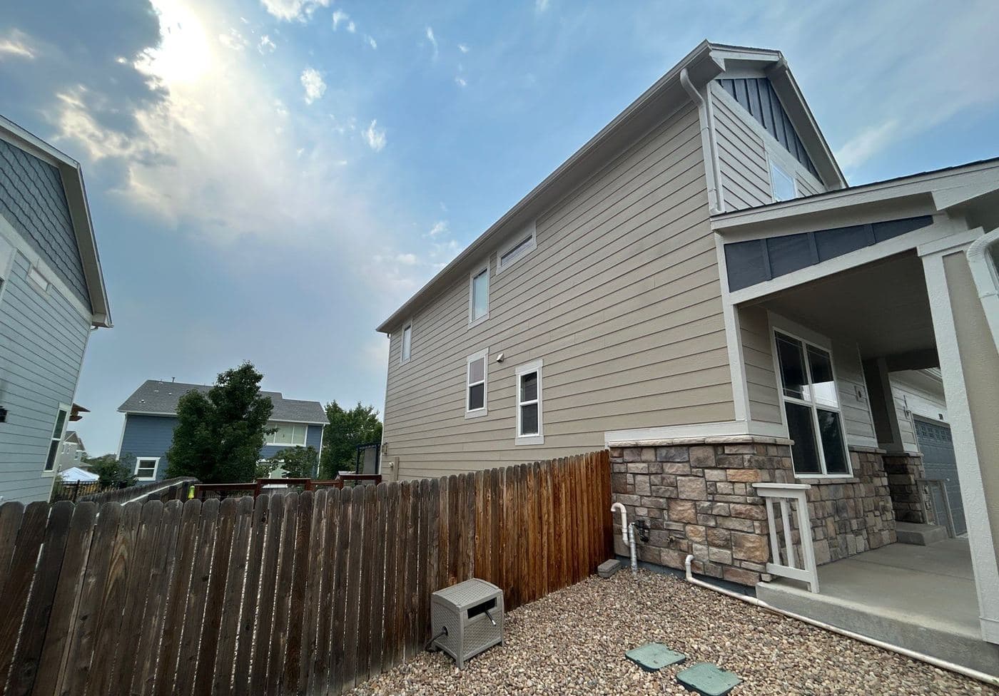 Stained boundary fence running along the side of a Denver metro home